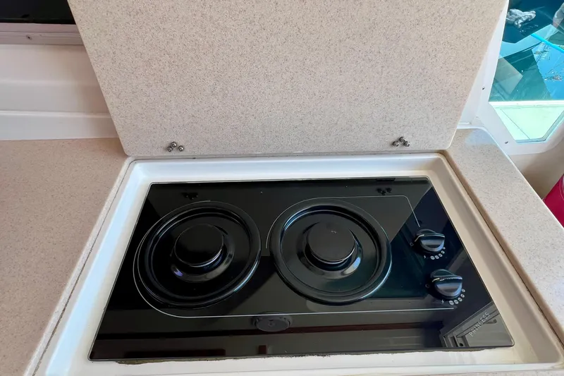 Cabrillo Yacht Photos Pics 2008 Back Cove 33 Express stove with two burners and control knobs.