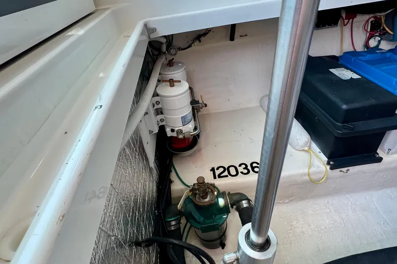 Cabrillo Yacht Photos Pics Engine compartment of 2008 Back Cove 33 Express, showing filters and battery setup.