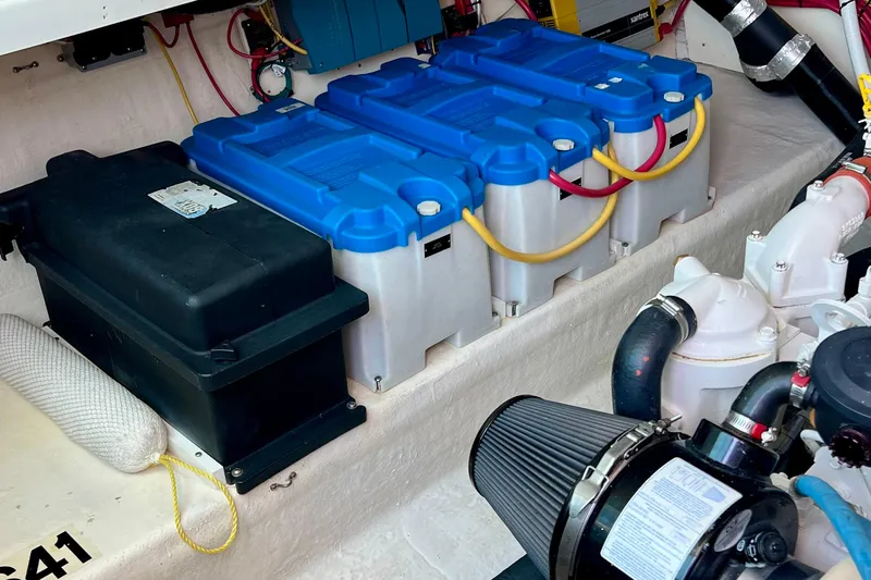 Cabrillo Yacht Photos Pics 2008 Back Cove 33 Express engine compartment with batteries and mechanical components.