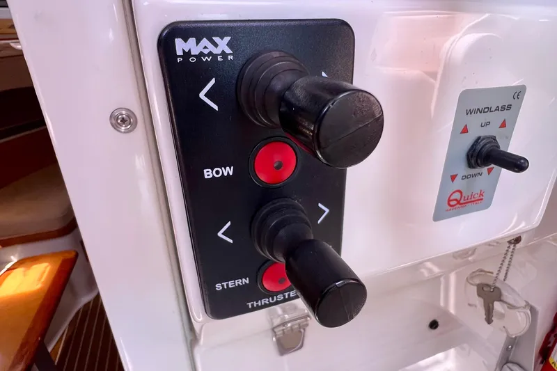 Cabrillo Yacht Photos Pics Control panel of a 2008 Back Cove 33 Express boat, featuring thruster and windlass controls.