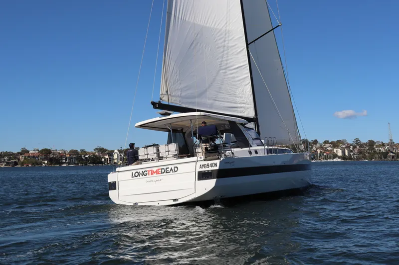 Long Time Dead Yacht Photos Pics 2017 Beneteau Oceanis Yacht 62 sailing on a sunny day, showcasing sleek design.