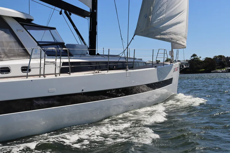 Long Time Dead Yacht Photos Pics 2017 Beneteau Oceanis Yacht 62 sailing on a sunny day, side view.