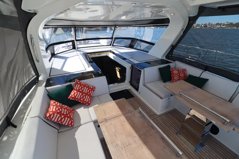 Long Time Dead Yacht Photos Pics Luxurious 2017 Beneteau Oceanis Yacht 62 interior with elegant seating and scenic ocean view.