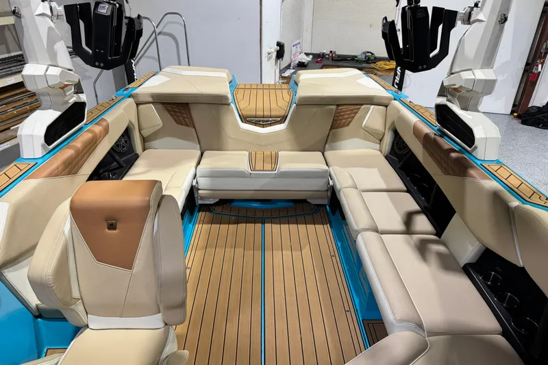  Yacht Photos Pics 2023 Nautique Super Air Nautique S23 interior with luxurious seating and modern design.