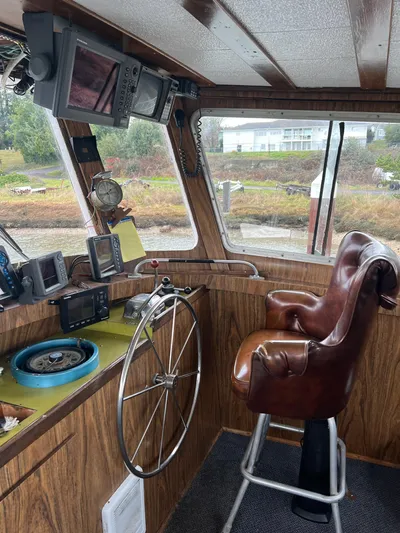 Mi Lana Yacht Photos Pics 1973 Little Hoquiam Fishing Vessel cockpit with navigation equipment and captain's chair.