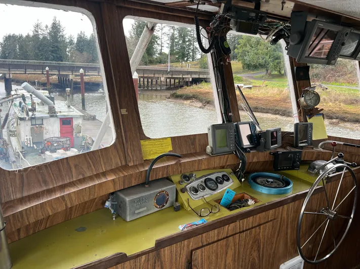 Mi Lana Yacht Photos Pics 1973 Little Hoquiam Fishing Vessel cockpit with navigation equipment and river view.