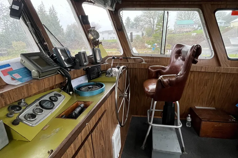 Mi Lana Yacht Photos Pics 1973 Little Hoquiam Fishing Vessel cockpit with navigation equipment and captain's chair.