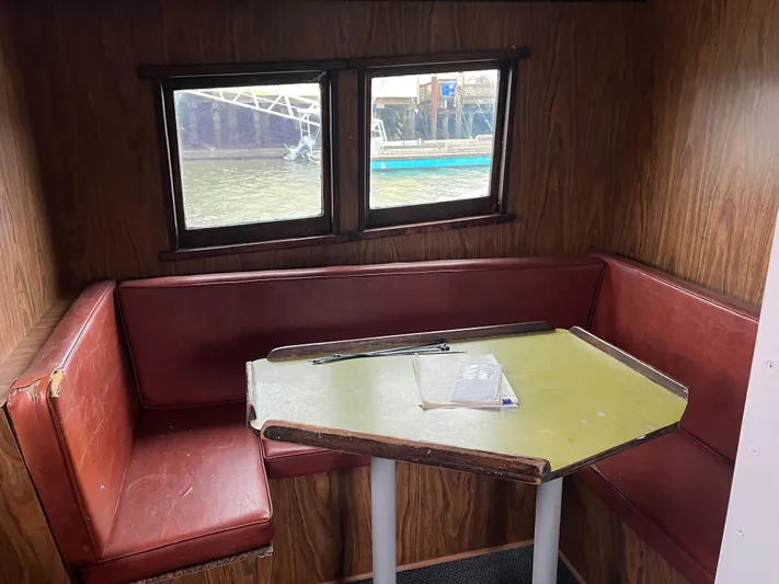 Mi Lana Yacht Photos Pics 1973 Little Hoquiam Fishing Vessel interior with red seating and table.