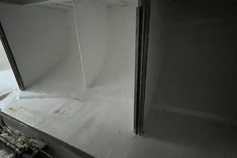 Mi Lana Yacht Photos Pics Interior of 1973 Little Hoquiam fishing vessel, showing clean, white-painted compartments.