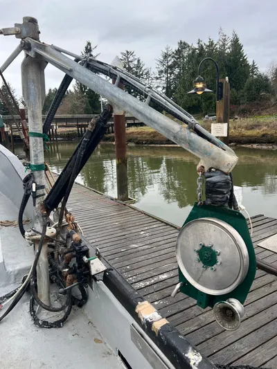 Mi Lana Yacht Photos Pics 1973 Little Hoquiam fishing vessel docked, featuring a mechanical winch and crane.