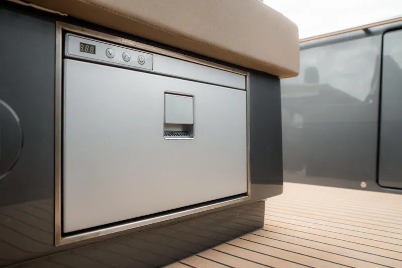  Yacht Photos Pics 2024 Pardo Yachts P43 interior detail, featuring a sleek built-in appliance on teak flooring.