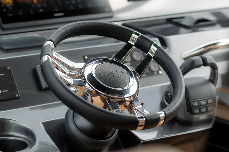  Yacht Photos Pics Steering wheel of 2024 Pardo Yachts P43, showcasing luxury yacht controls.