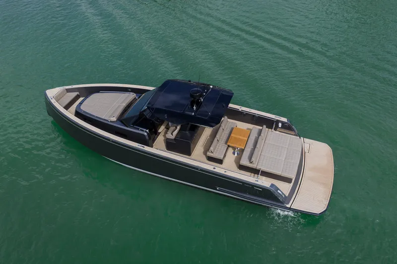  Yacht Photos Pics 2024 Pardo Yachts P43 luxury yacht cruising on clear green water.