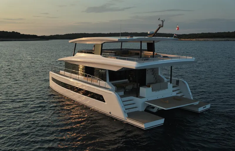  Yacht Photos Pics Silent 62 yacht, 2026 model, cruising at sunset on calm waters.