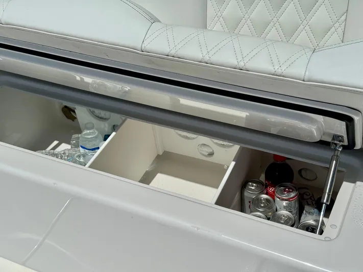  Yacht Photos Pics Built-in cooler on 2020 Invincible 36' Open Fisherman boat with drinks.