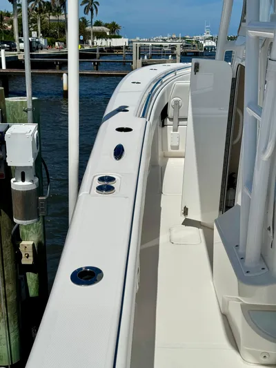  Yacht Photos Pics 2020 Invincible 36' Open Fisherman boat docked at marina.