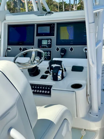  Yacht Photos Pics Control panel of a 2020 Invincible 36' Open Fisherman boat with advanced navigation systems.