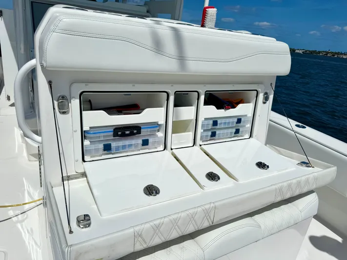  Yacht Photos Pics 2020 Invincible 36' Open Fisherman boat with organized storage compartments.