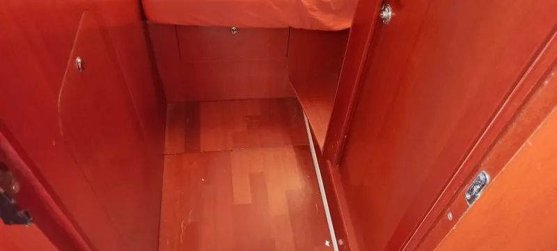 Kaskara Yacht Photos Pics Interior of 2007 Beneteau Oceanis Clipper 523 with wooden flooring and cabinetry.