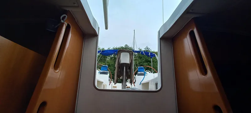 Kaskara Yacht Photos Pics Interior view of 2007 Beneteau Oceanis Clipper 523 sailboat, showcasing cockpit and helm.