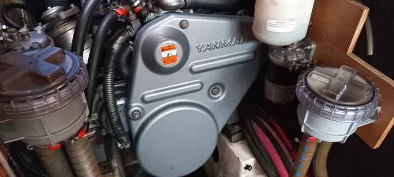 Kaskara Yacht Photos Pics Engine compartment of a 2007 Beneteau Oceanis Clipper 523 with Yanmar components.