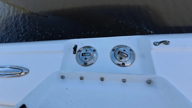 Johnny Be Good Yacht Photos Pics 2012 Intrepid 327 CC boat deck with fuel and water caps.