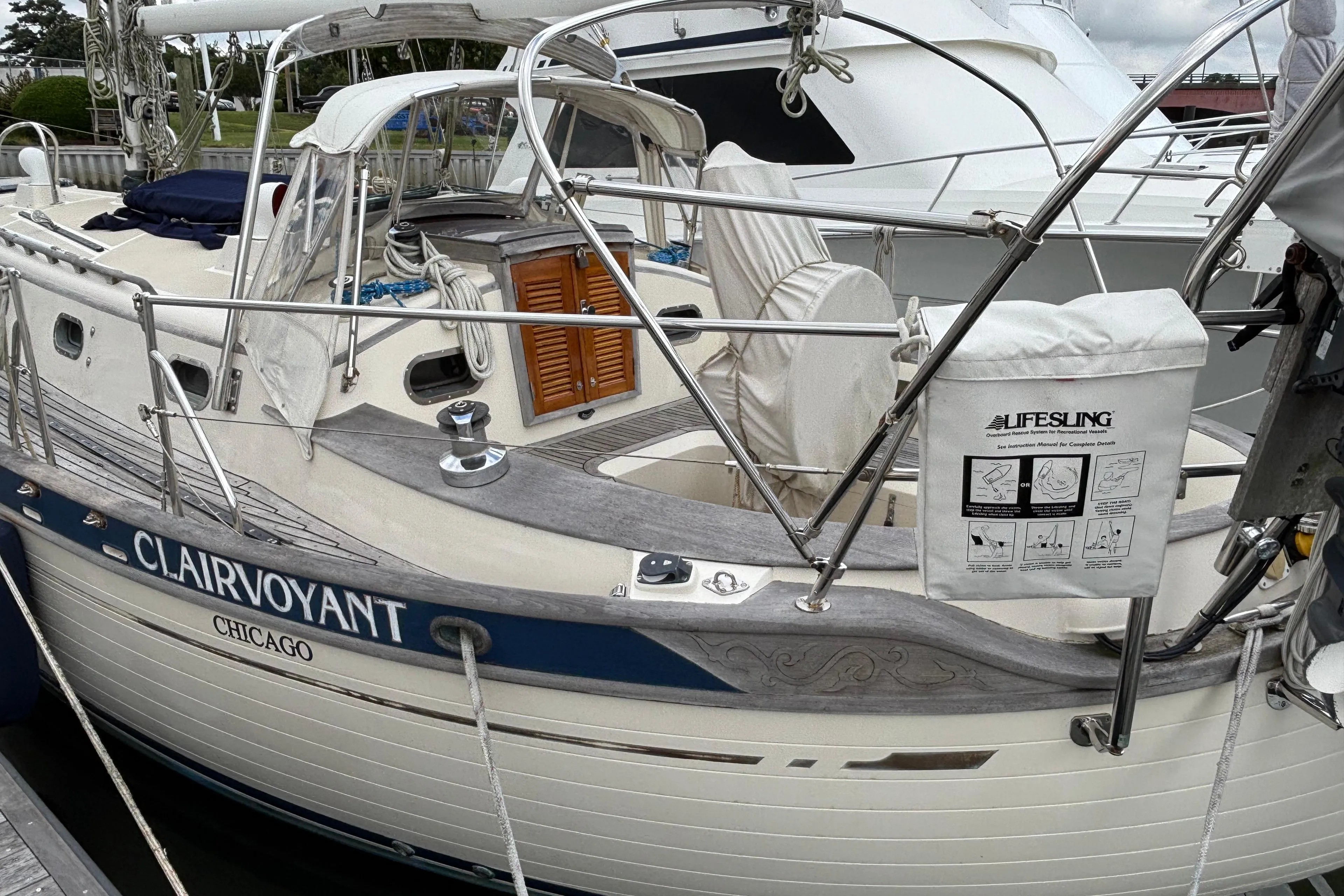 1987 Ta Shing Tashiba 36 sailboat named "Clairvoyant" docked, featuring a Lifesling safety device.