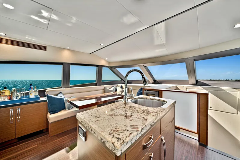West Yacht Photos Pics Luxurious interior of 2017 Hatteras 60 Motor Yacht with ocean view.