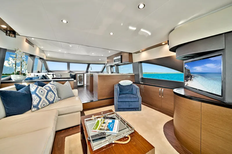 West Yacht Photos Pics Luxurious interior of 2017 Hatteras 60 Motor Yacht with modern furnishings and ocean view.