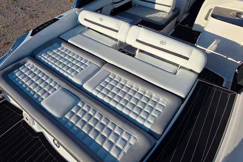  Yacht Photos Pics Luxurious seating on 2023 Cobalt R30 boat, featuring elegant white upholstery and modern design.