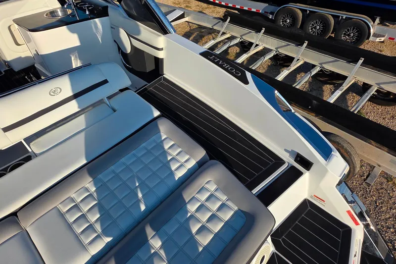  Yacht Photos Pics 2023 Cobalt R30 boat interior with luxurious seating and sleek design.