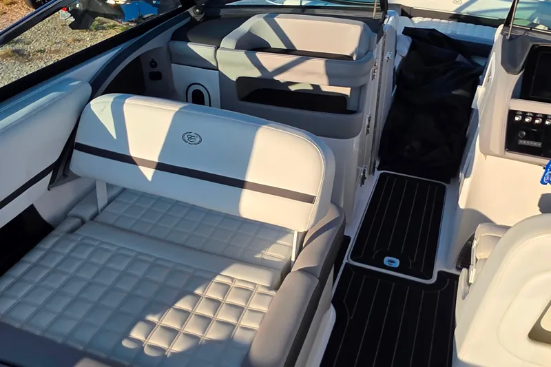  Yacht Photos Pics 2023 Cobalt R30 boat interior with luxurious white seating and modern design.