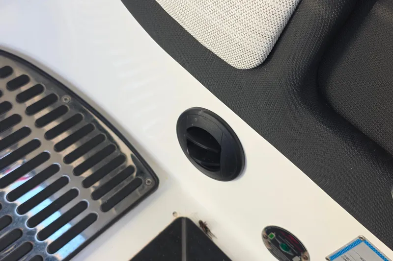  Yacht Photos Pics 2023 Cobalt R30 boat interior detail with vent and metal grate.