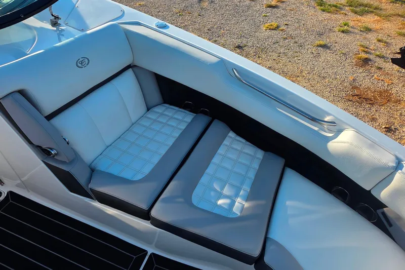  Yacht Photos Pics 2023 Cobalt R30 boat interior with luxurious white and gray seating.