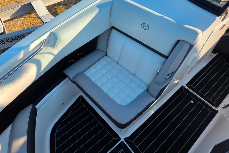  Yacht Photos Pics 2023 Cobalt R30 boat interior with white and gray seating, elegant design.