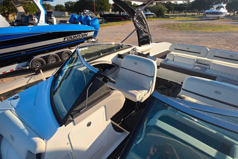  Yacht Photos Pics 2023 Cobalt R30 boat interior with white seating and sleek design.