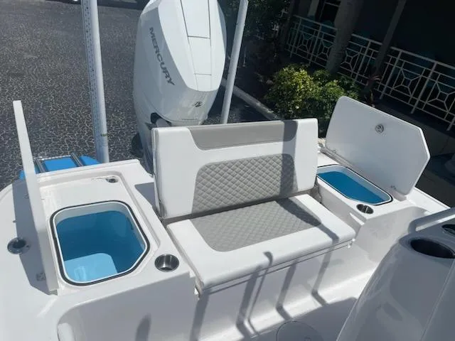  Yacht Photos Pics Caymas 26 HB 2023 boat with seating and storage compartments.