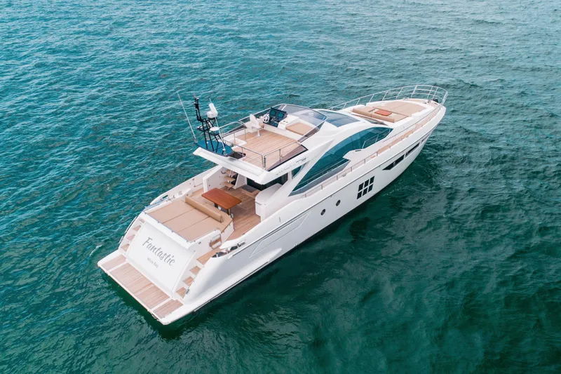 Fantastic Yacht Photos Pics 2019 Azimut 77S yacht cruising on open water, showcasing sleek design and luxury features.