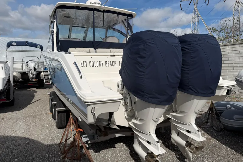  Yacht Photos Pics 2023 Pursuit DC 295 Dual Console boat with covered engines, Key Colony Beach, Florida.
