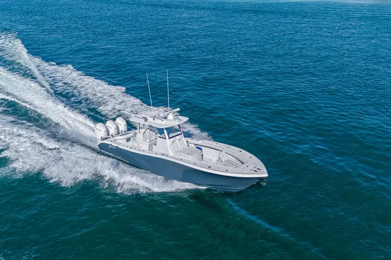 New Stock Yacht Photos Pics 2026 Yellowfin 36 Offshore boat cruising on open blue water.