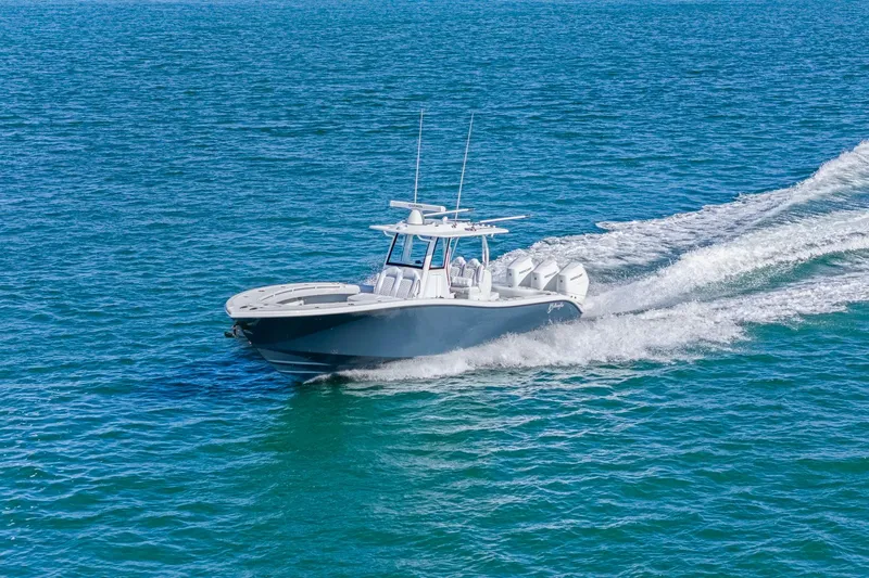 New Stock Yacht Photos Pics 2026 Yellowfin 36 Offshore boat cruising on open blue water.