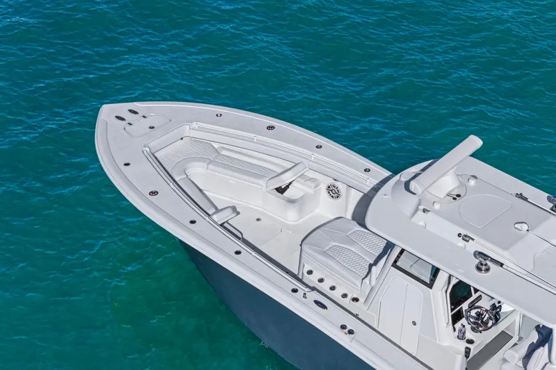 New Stock Yacht Photos Pics 2026 Yellowfin 36 Offshore boat on clear blue water.