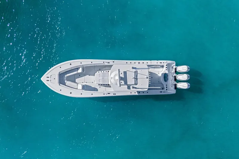 New Stock Yacht Photos Pics Aerial view of 2026 Yellowfin 36 Offshore boat on clear blue water.