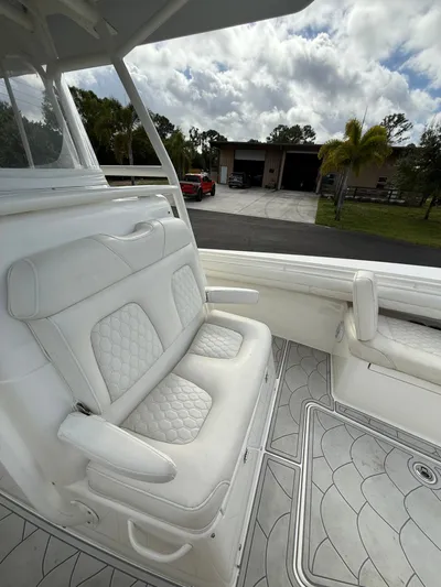 Drillin'n Billin Yacht Photos Pics Interior of a 2017 Regulator 28 boat with white seating.