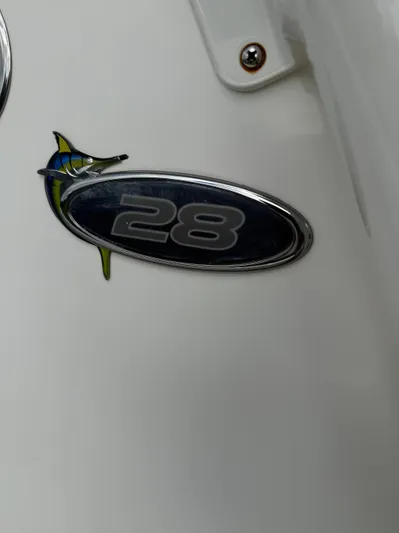 Drillin'n Billin Yacht Photos Pics Regulator 28 boat emblem with fish design, year 2017.