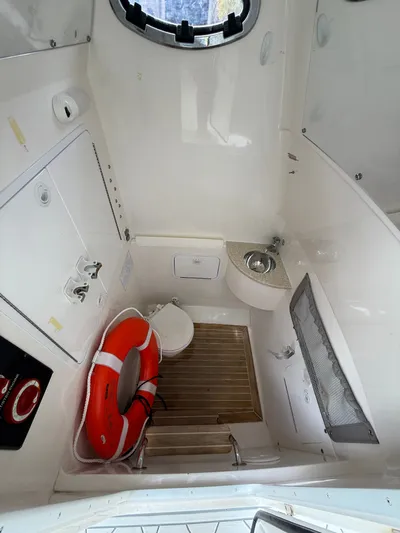 Drillin'n Billin Yacht Photos Pics Interior of a 2017 Regulator 28 yacht with sink and life preserver.