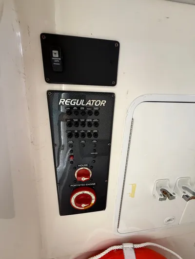 Drillin'n Billin Yacht Photos Pics Regulator 28 boat control panel, 2017 model, featuring switches and fuses.