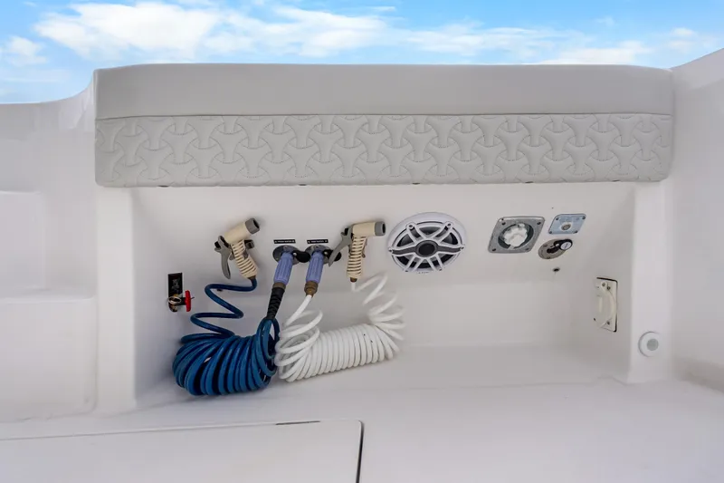  Yacht Photos Pics 2024 Intrepid 41 Valor boat utility panel with hoses and speaker.