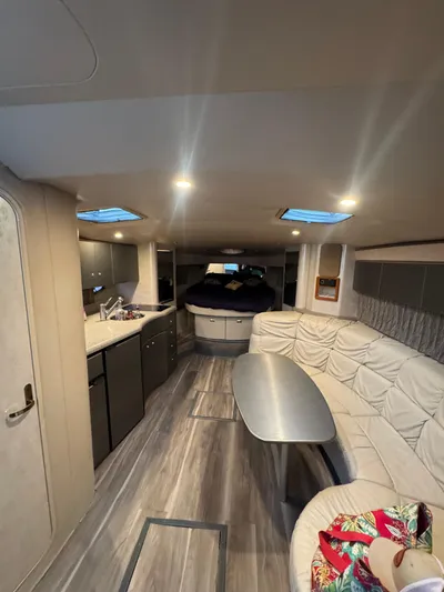 Cash Is King Yacht Photos Pics Interior of a 2002 Formula 40 PC yacht with modern furnishings and ambient lighting.