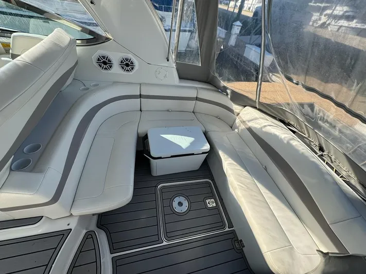 Cash Is King Yacht Photos Pics Interior of a 2002 Formula 40 PC yacht with white seating and modern design.